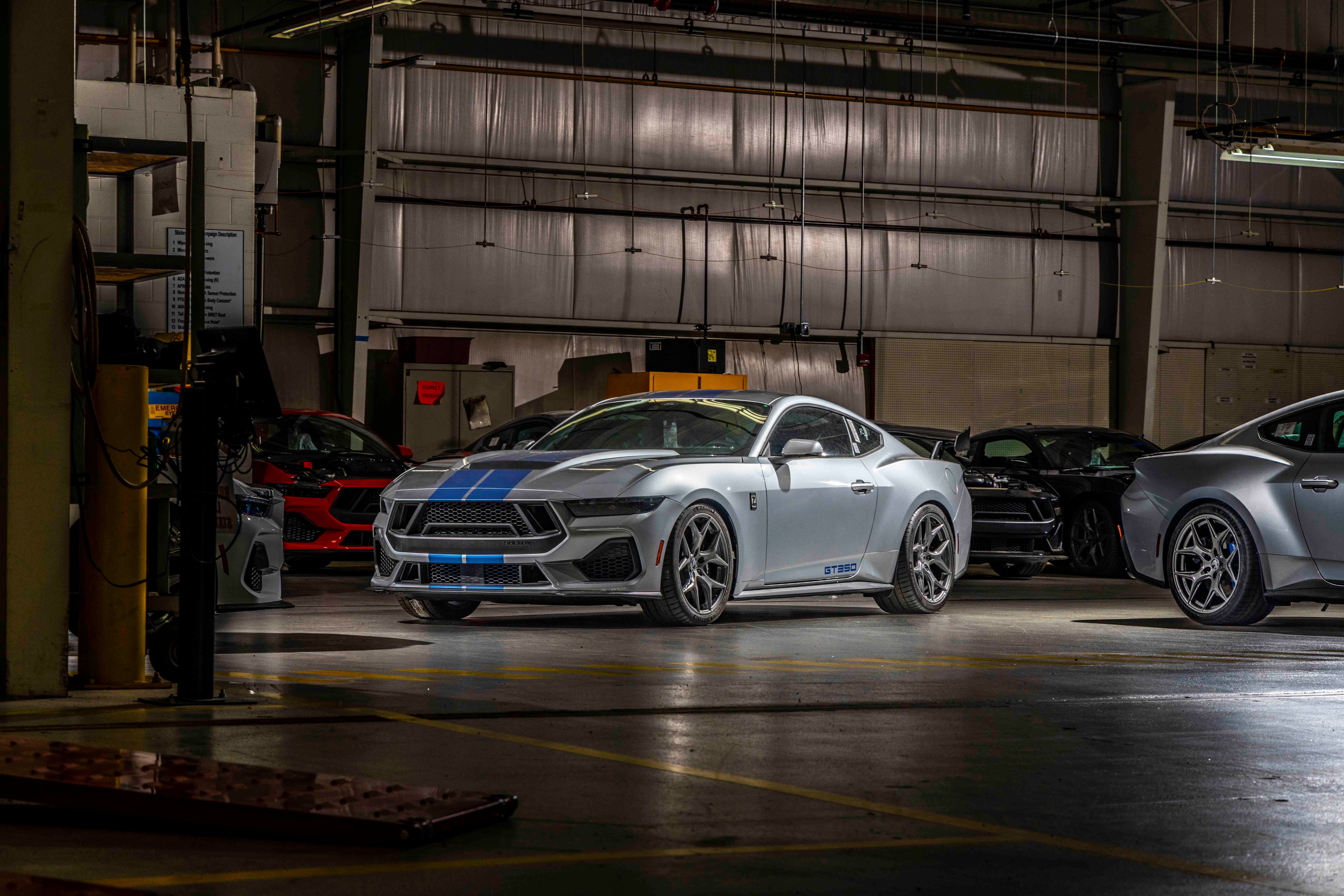 Silver Shelby GT350 in performance garage